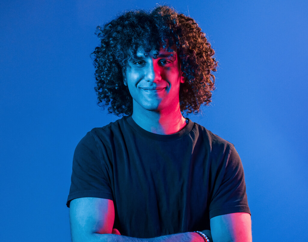 posing for a camera young beautiful man with curl 2021 09 03 14 42 52 utc